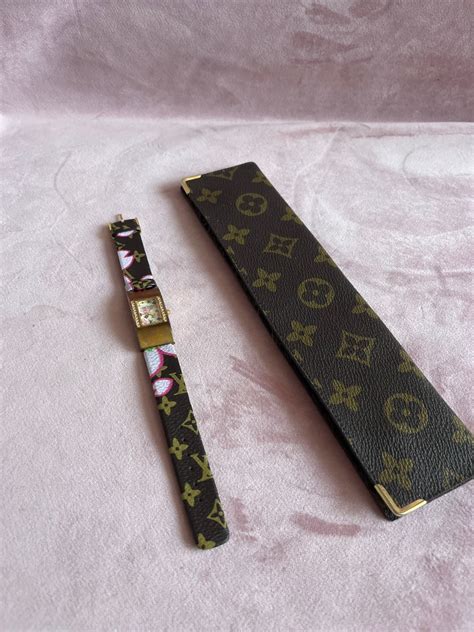 Vintage Louis Vuitton 4628HS2002L watch and case. 